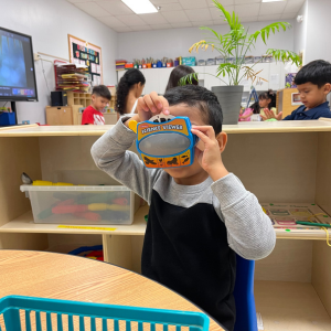 Student playing in classroom